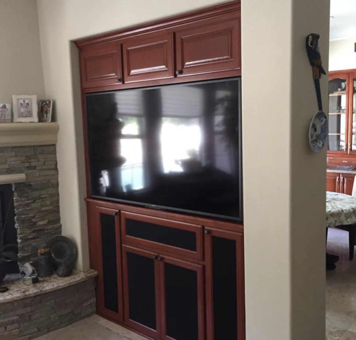 Custom entertainment built-in San Francisco — cabinet and display shelves