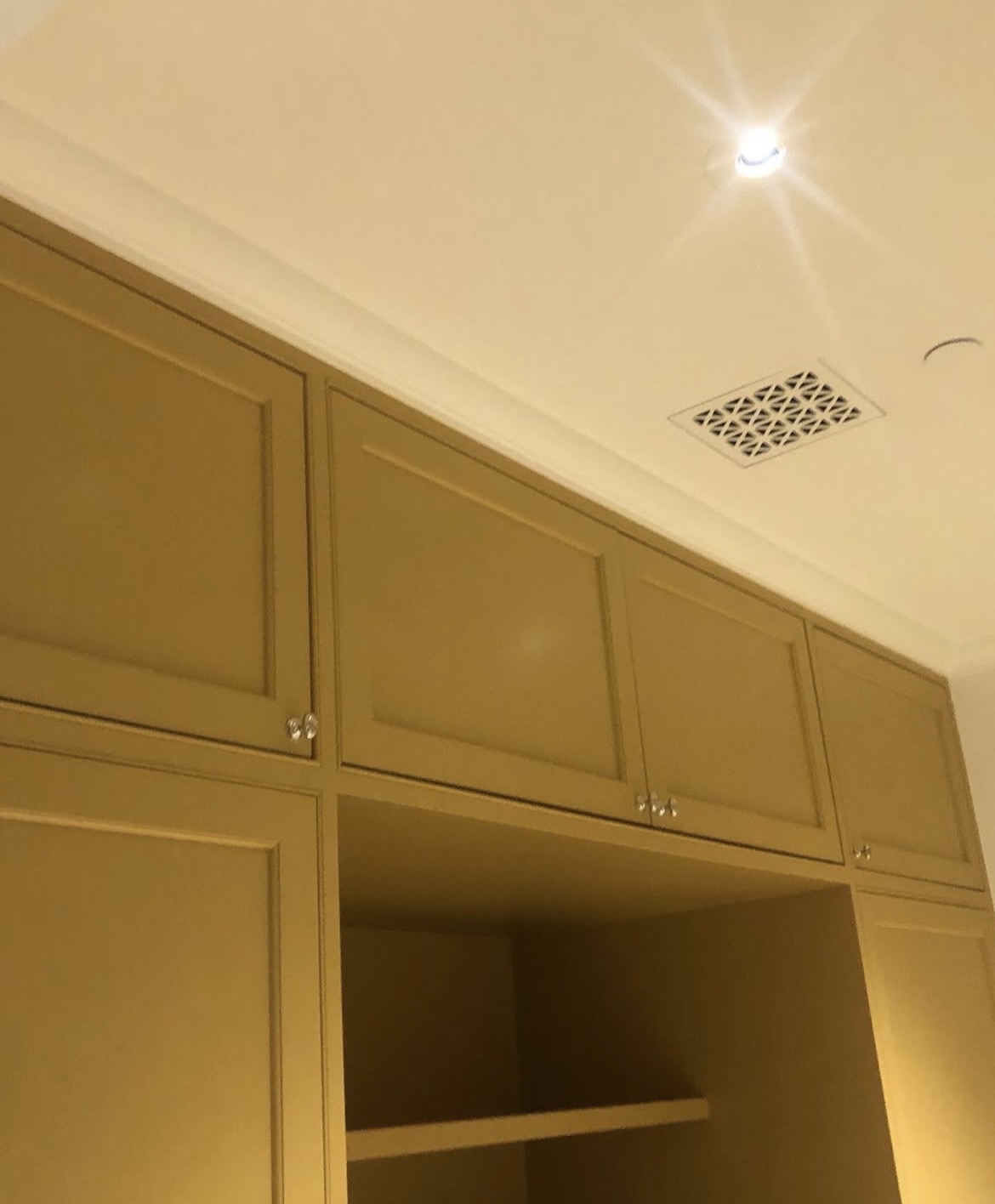 Custom kitchen cabinet installation San Francisco — upper cabinets with crown molding